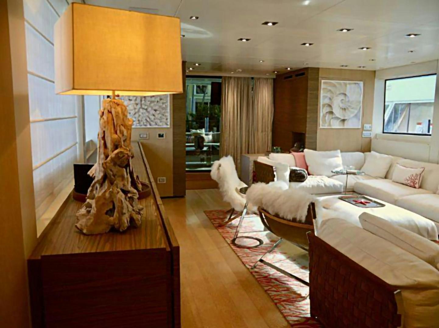 a living room with a statue aboard No Name Yacht for Sale