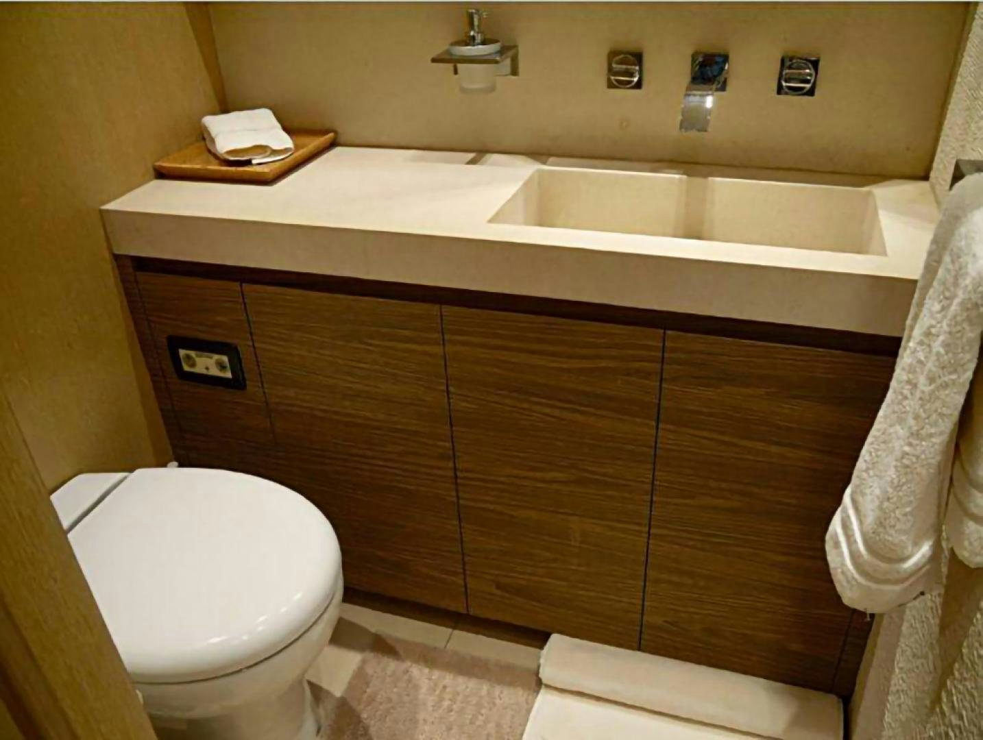 a bathroom with a sink and toilet aboard No Name Yacht for Sale