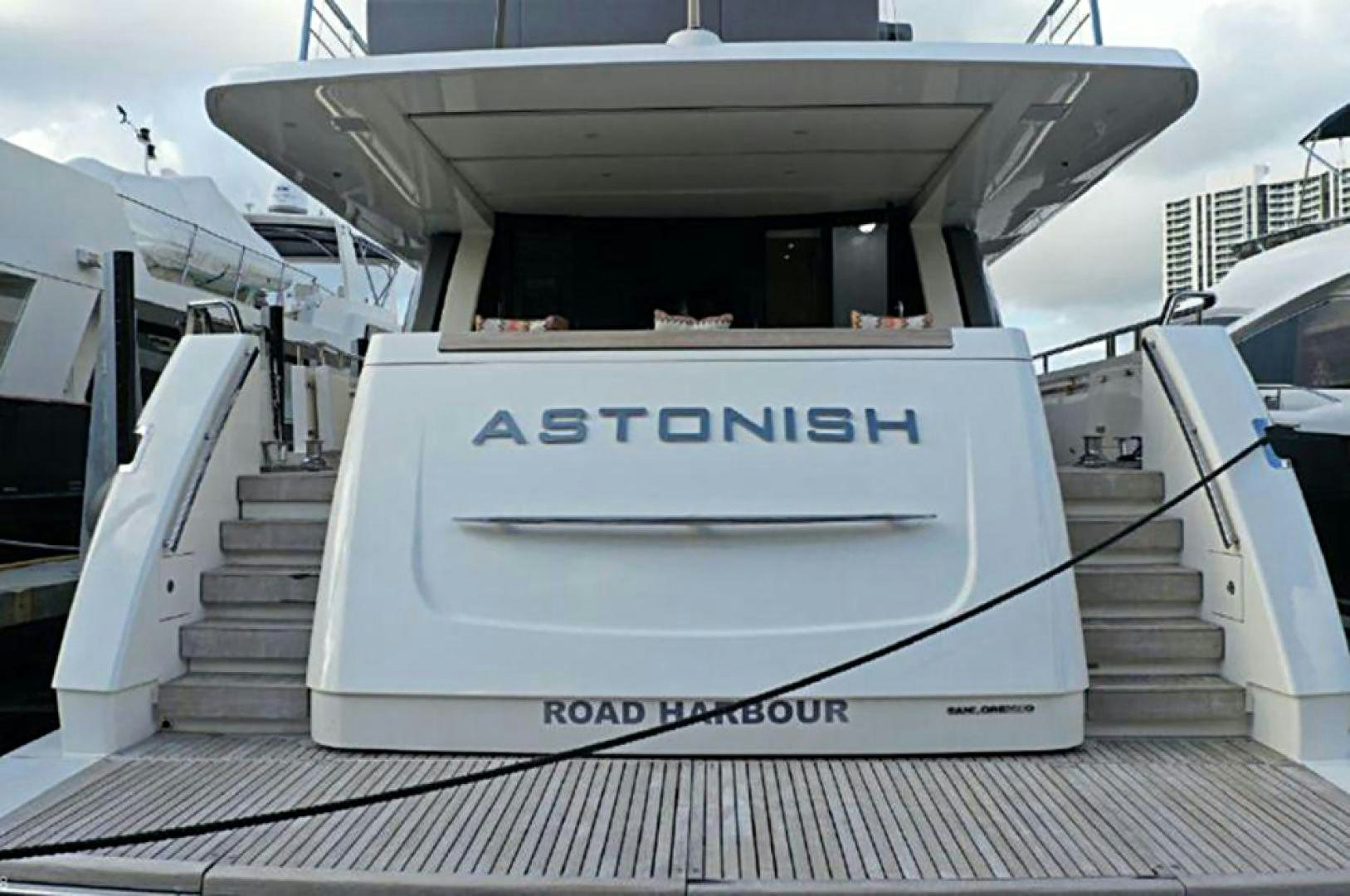 a white boat with a sign on the front aboard No Name Yacht for Sale