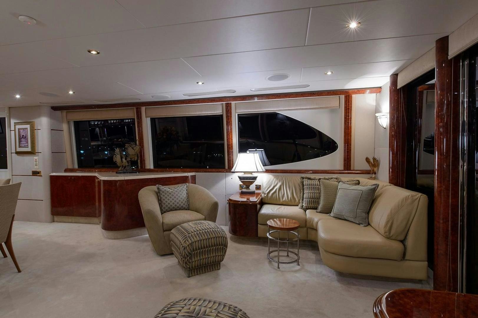 a living room with a large television aboard BIG WAVE Yacht for Sale