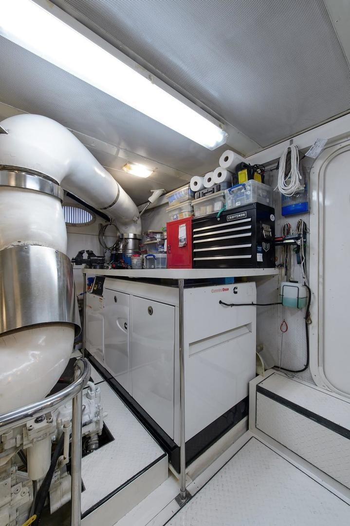 a kitchen with stainless steel appliances aboard BIG WAVE Yacht for Sale