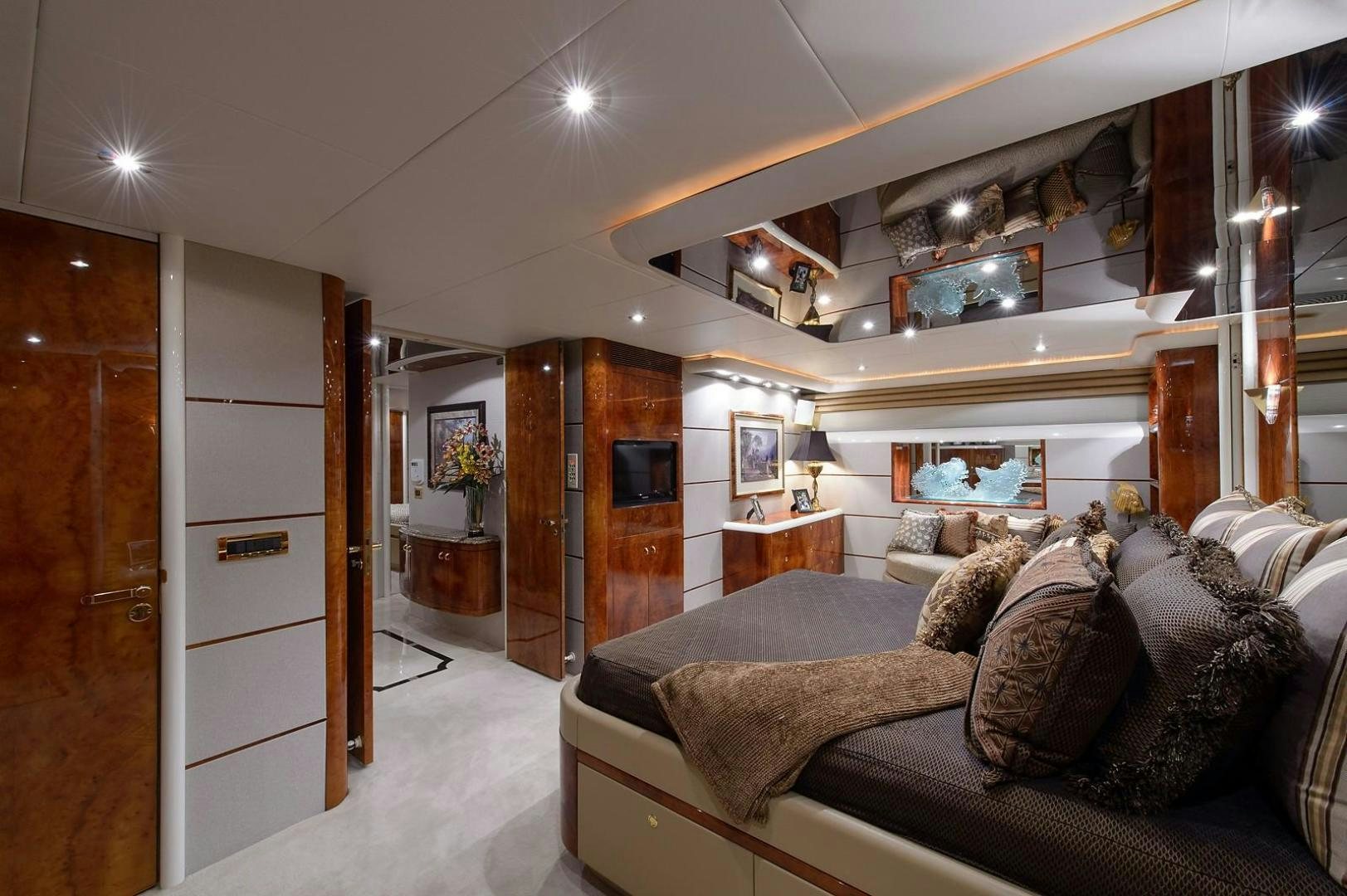 a living room with a couch aboard BIG WAVE Yacht for Sale