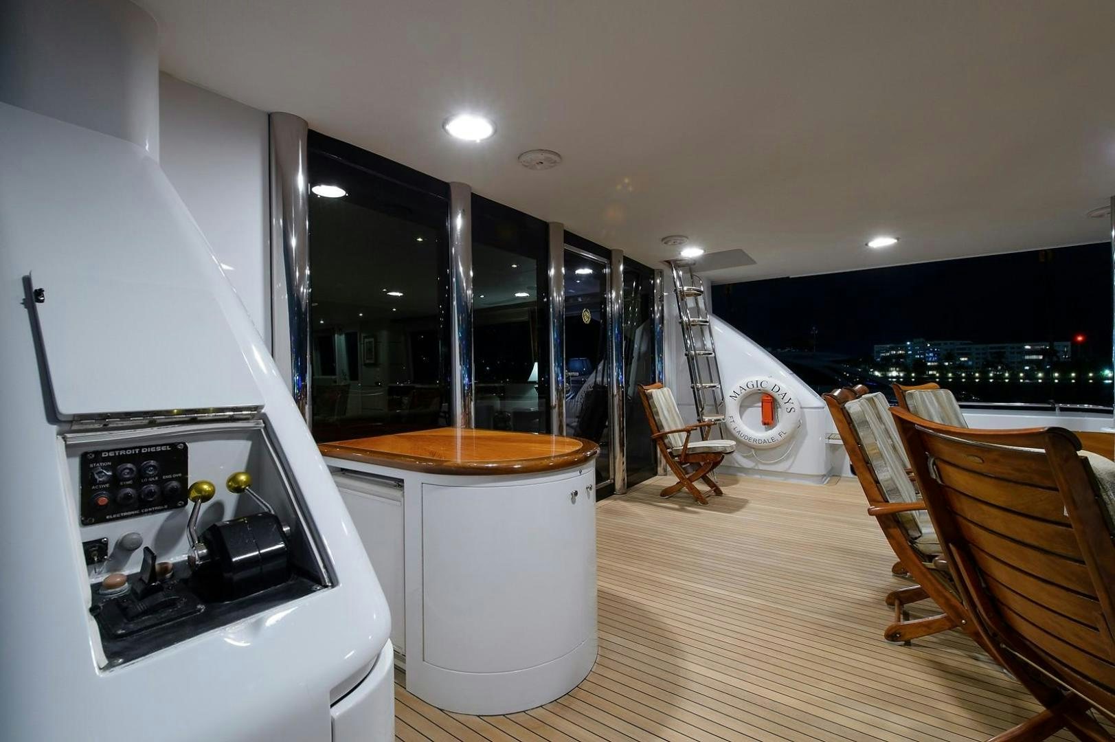 a kitchen with a large window aboard BIG WAVE Yacht for Sale