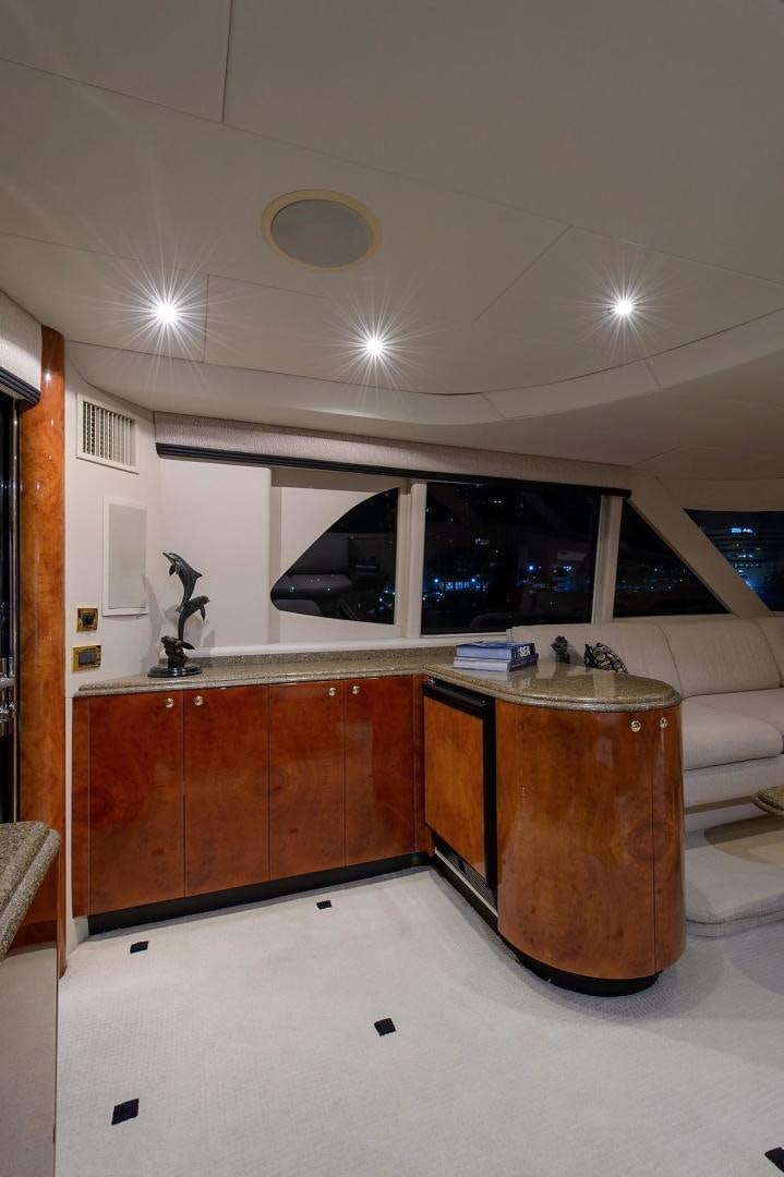 a kitchen with a sink and cabinets aboard BIG WAVE Yacht for Sale