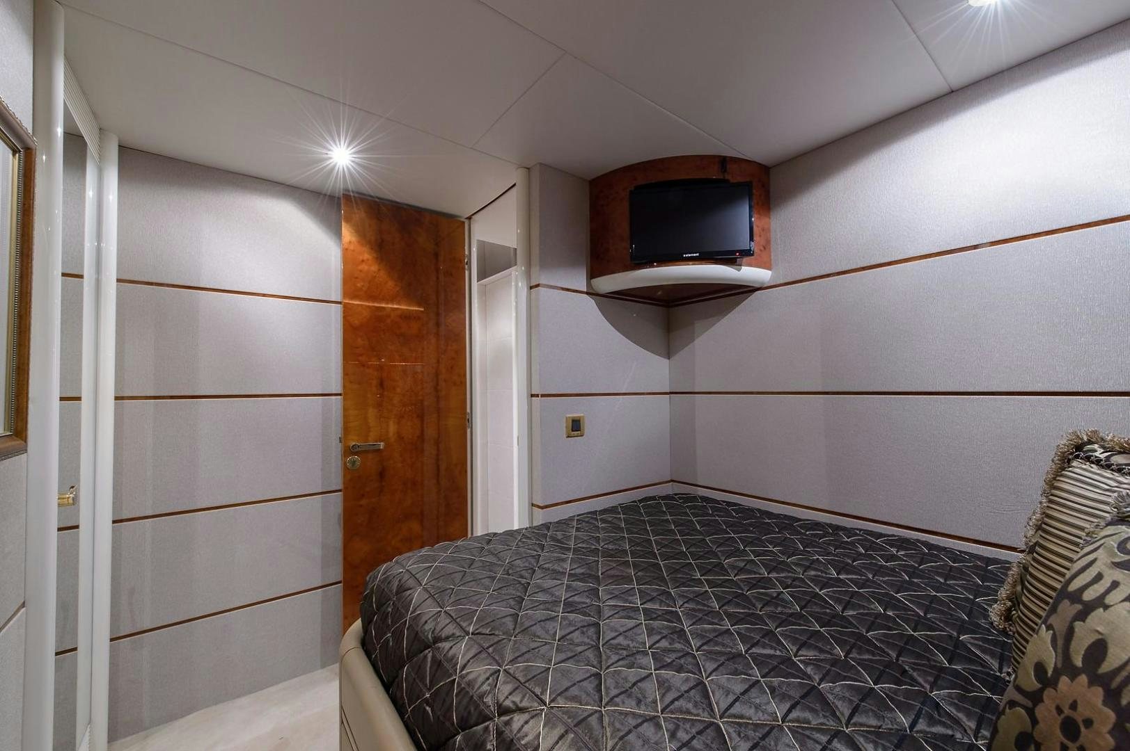 a bed in a room aboard BIG WAVE Yacht for Sale