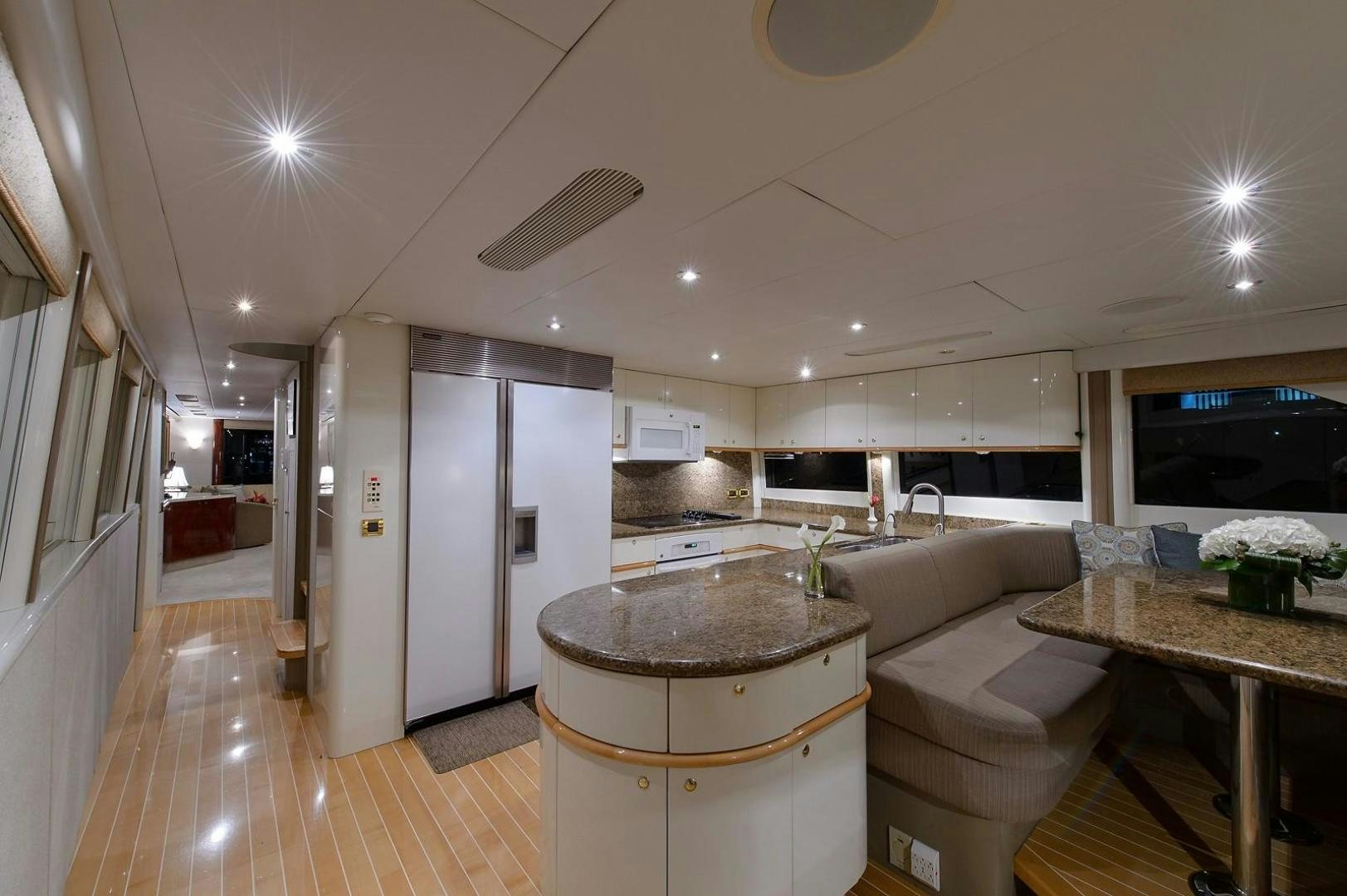 a kitchen with a large sink aboard BIG WAVE Yacht for Sale