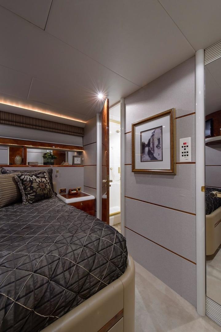 a bed in a room aboard BIG WAVE Yacht for Sale