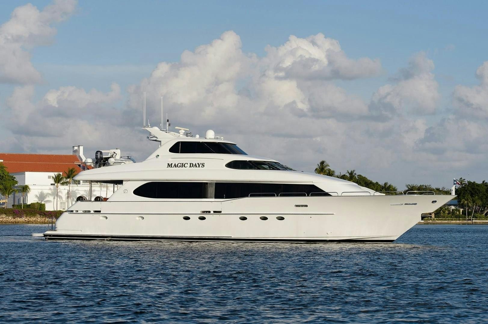 a white yacht on the water aboard MAGIC DAYS Yacht for Sale