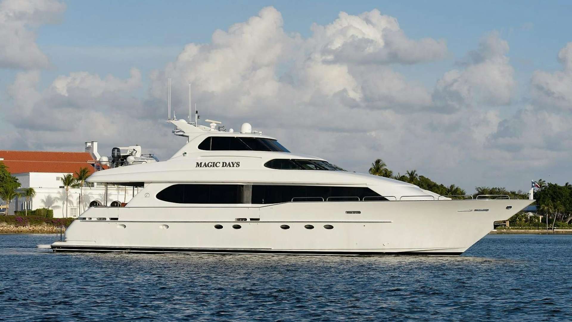 a white yacht on the water aboard MAGIC DAYS Yacht for Sale