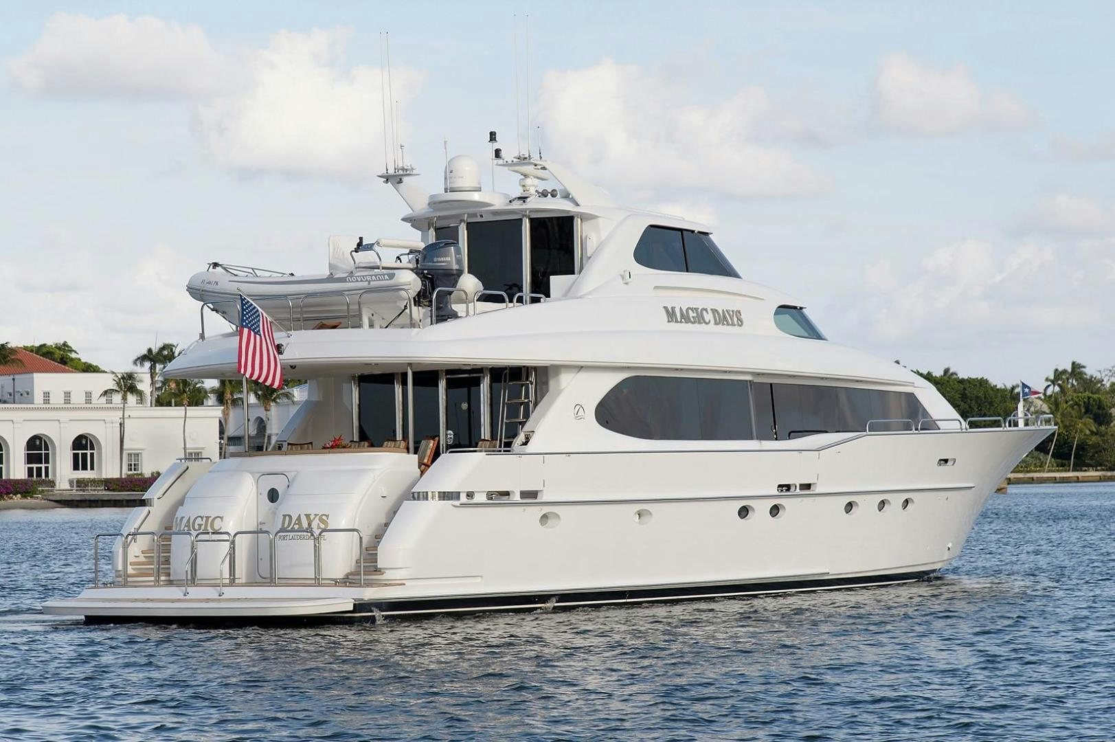 a white yacht on the water aboard BIG WAVE Yacht for Sale