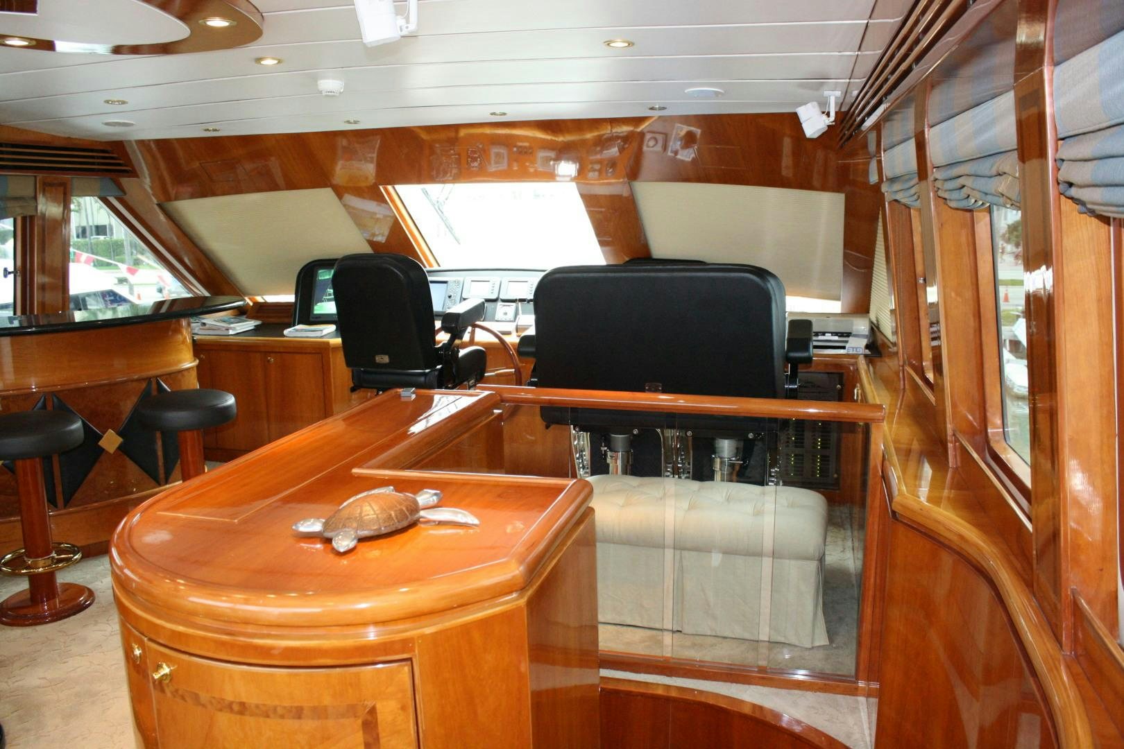 inside of a vehicle with a table and chairs aboard CRYSTAL ANNE Yacht for Sale