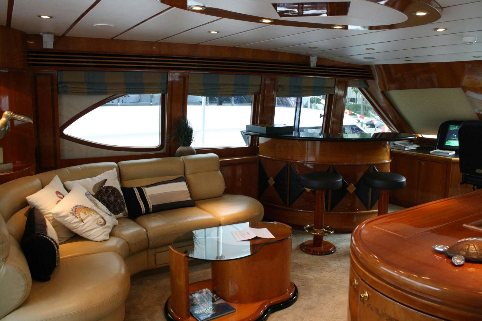 a living room with a couch and a table aboard CRYSTAL ANNE Yacht for Sale