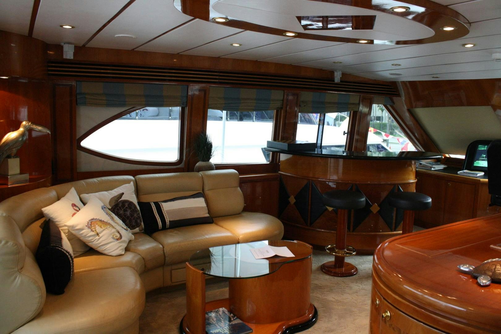 a living room with a couch and a table aboard CRYSTAL ANNE Yacht for Sale