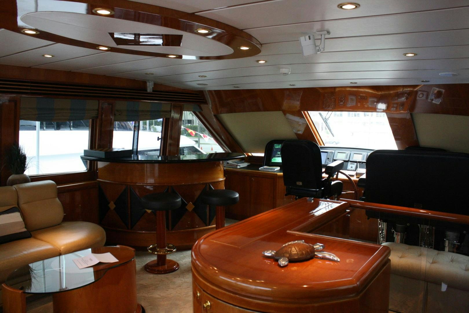a room with a table and chairs aboard CRYSTAL ANNE Yacht for Sale