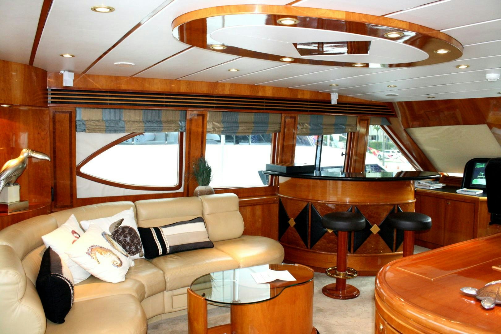 a living room with a couch and a table aboard CRYSTAL ANNE Yacht for Sale