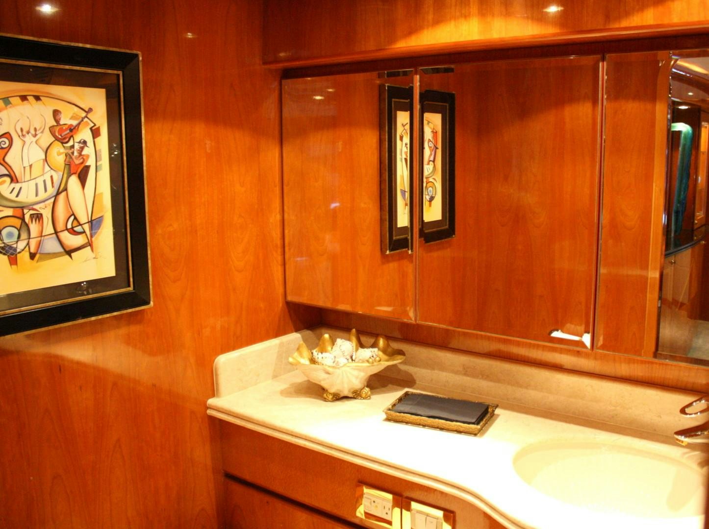 a bathroom with a phone on the counter aboard CRYSTAL ANNE Yacht for Sale