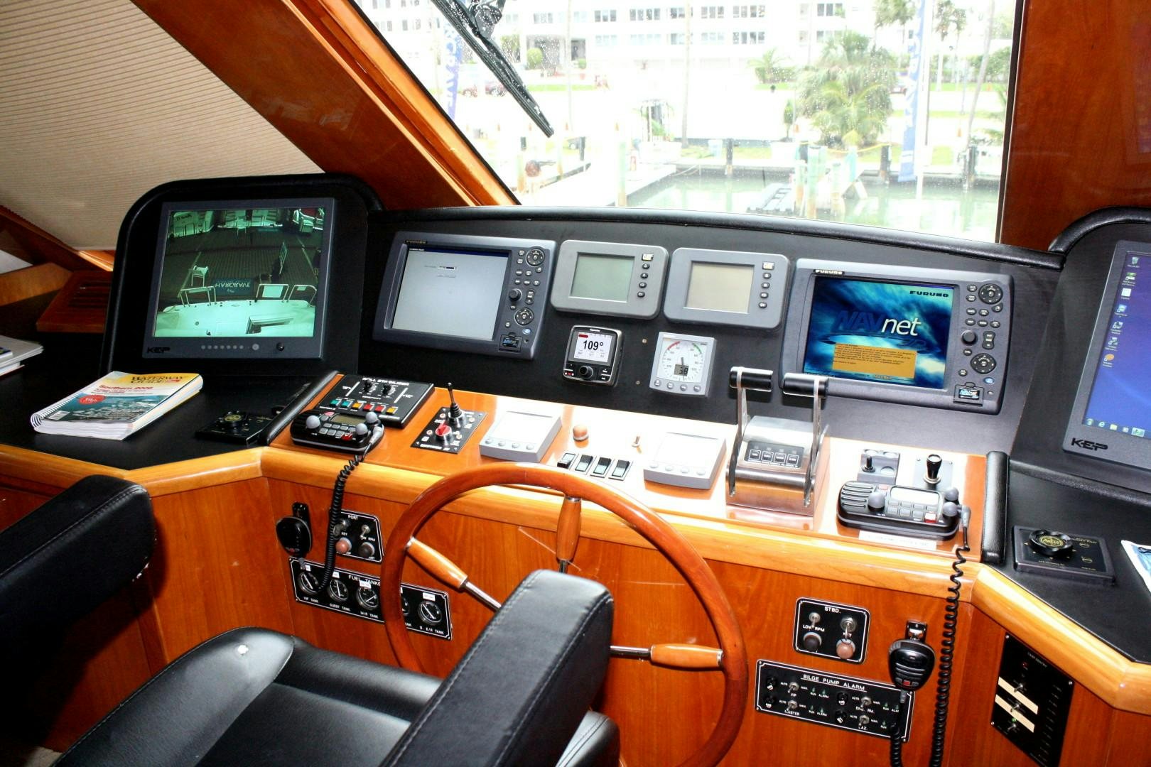 a control panel with many monitors aboard CRYSTAL ANNE Yacht for Sale