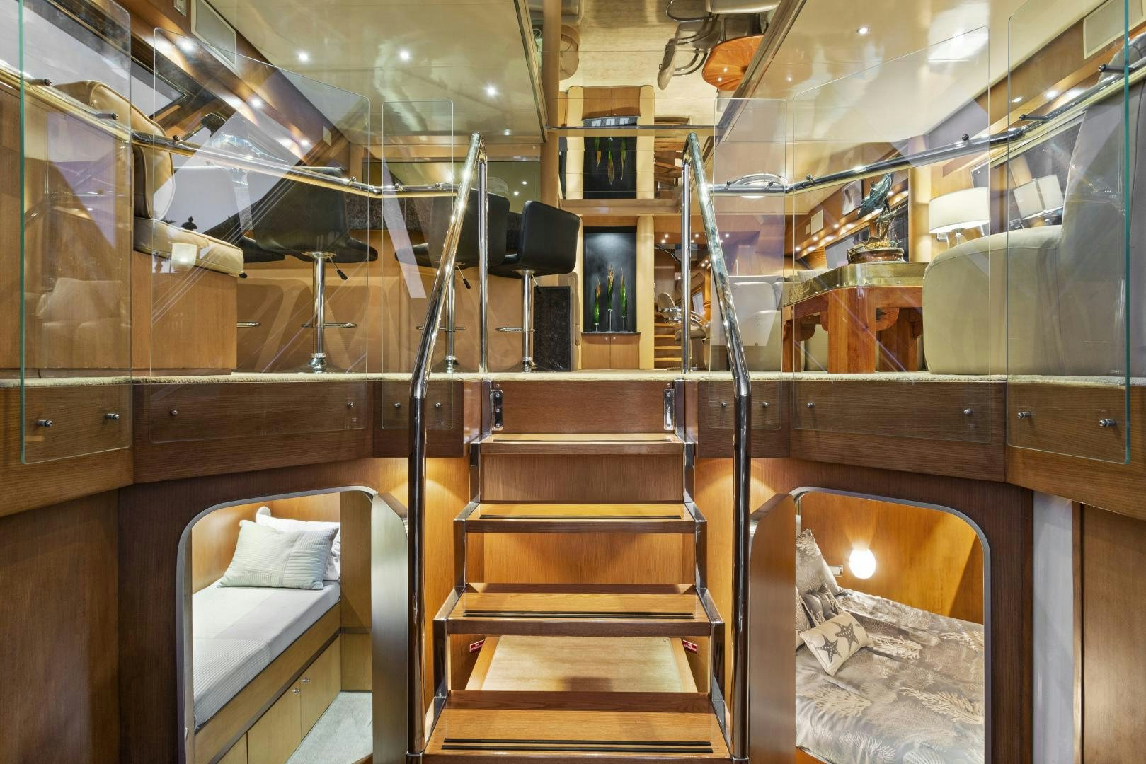 a room with wooden stairs aboard THE FLYING DUTCHMAN Yacht for Sale