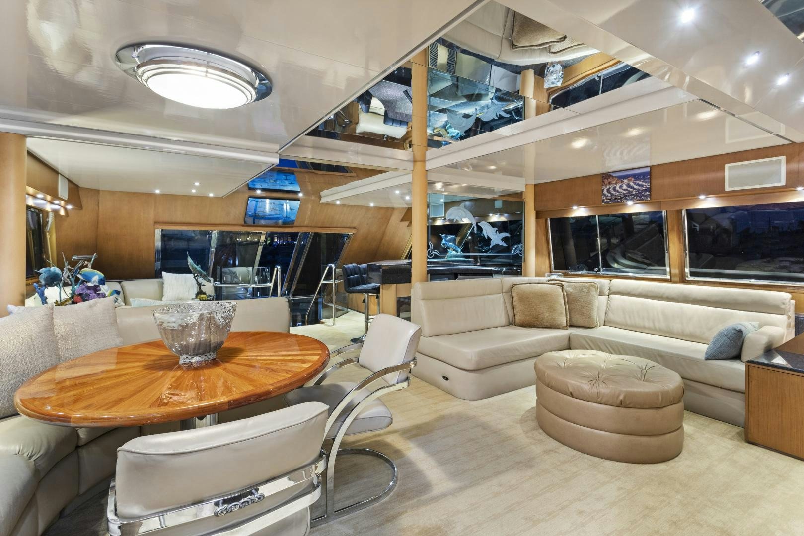 a living room with a couch and a table aboard THE FLYING DUTCHMAN Yacht for Sale