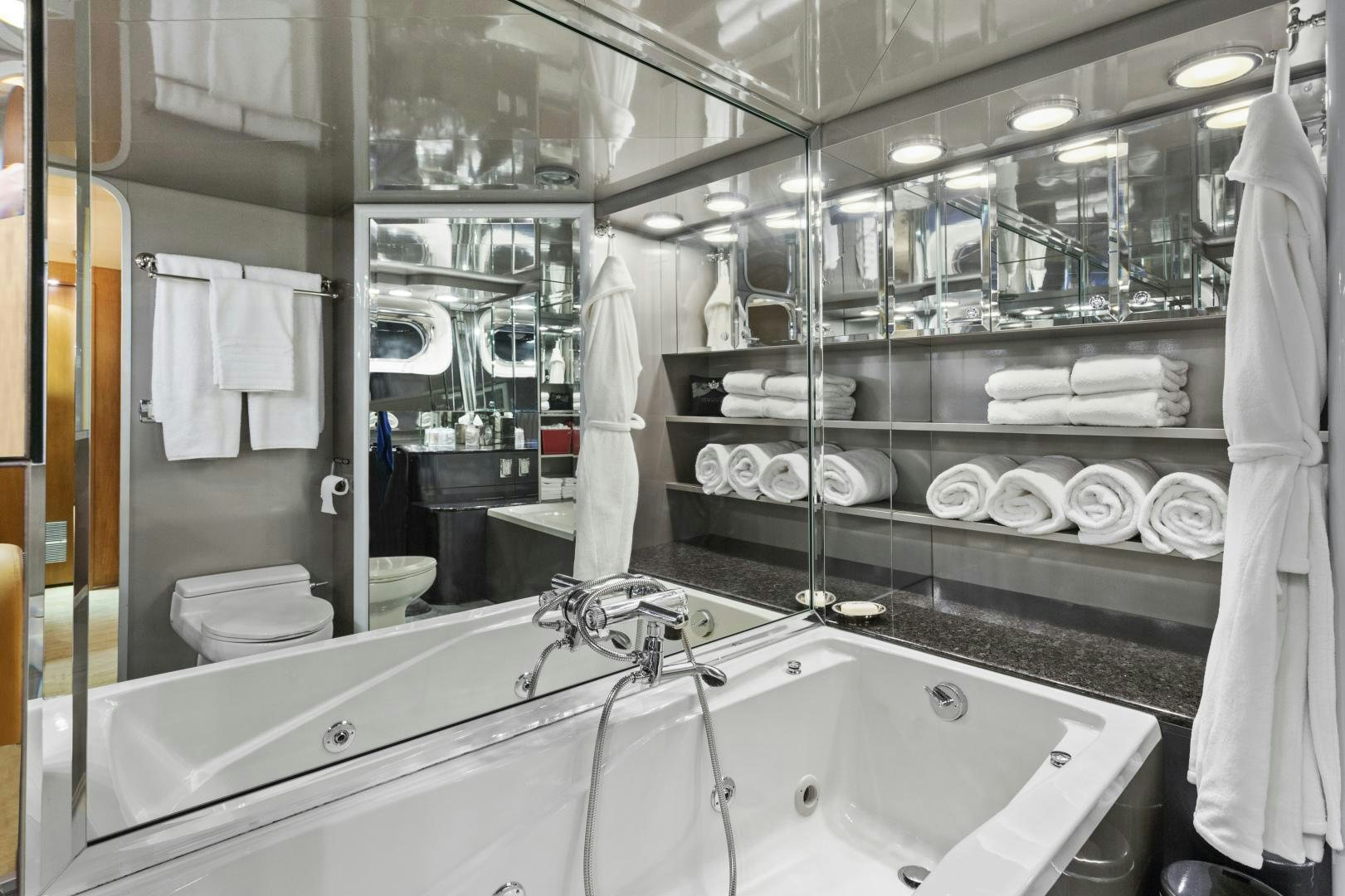 a bathroom with a sink and a bathtub aboard THE FLYING DUTCHMAN Yacht for Sale
