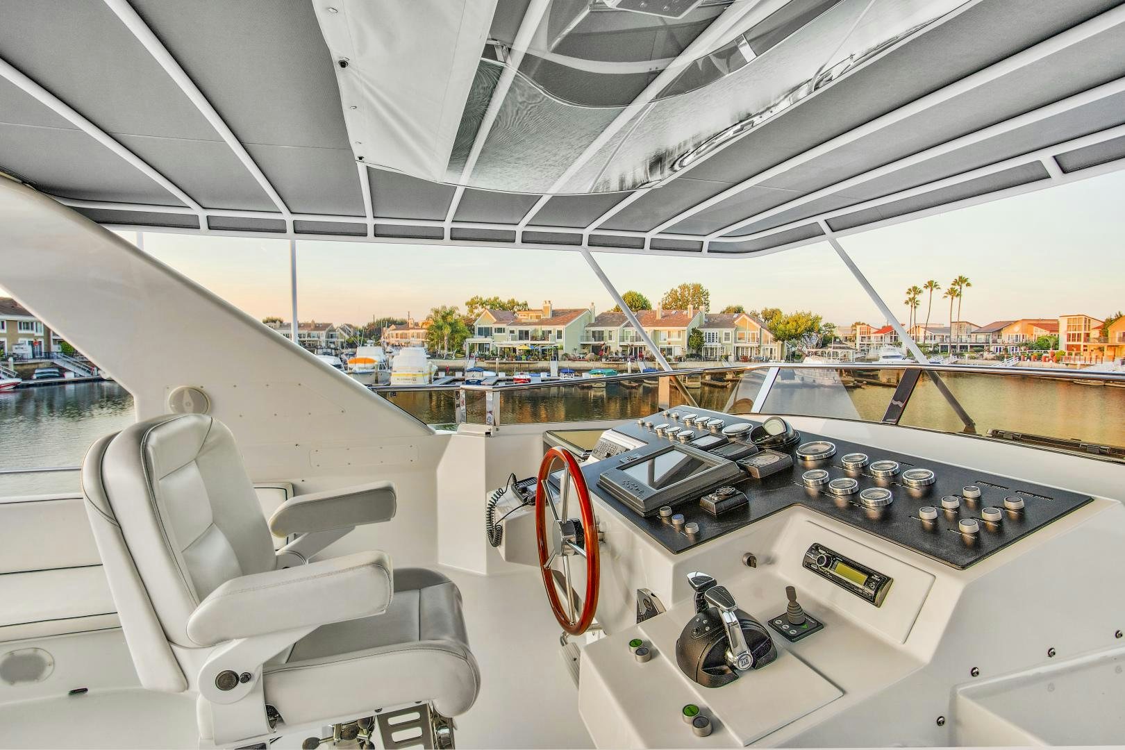 inside of a building with a car and a view of a city aboard THE FLYING DUTCHMAN Yacht for Sale
