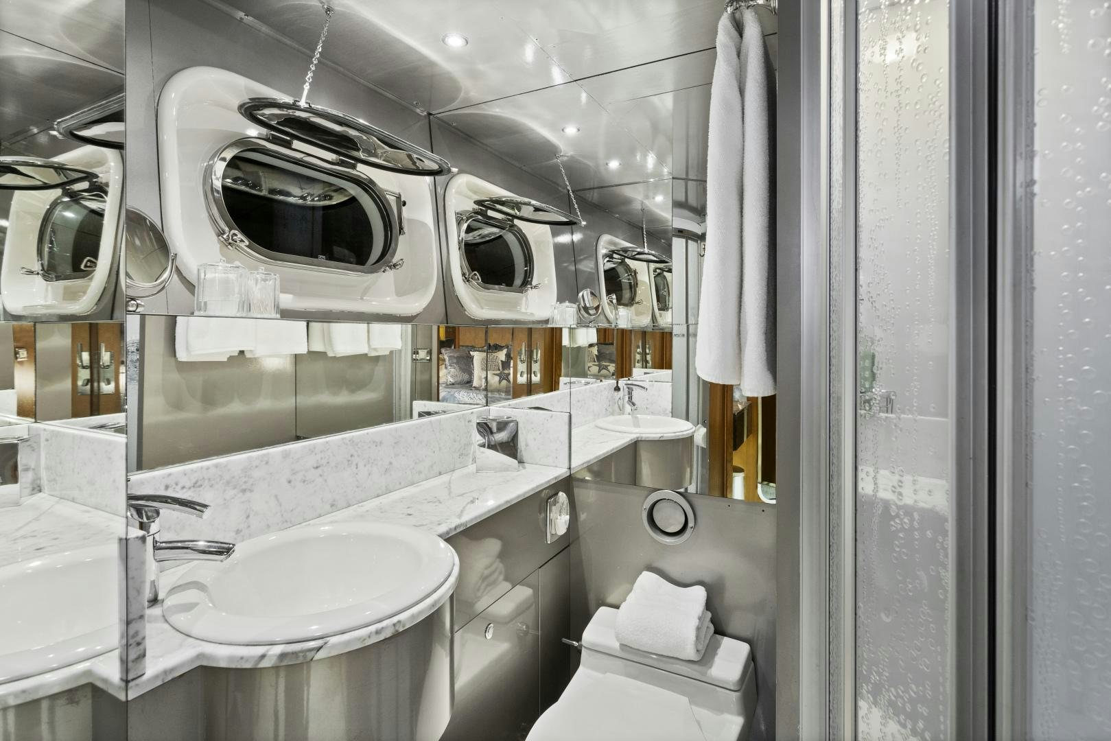 a bathroom with a sink and a mirror aboard THE FLYING DUTCHMAN Yacht for Sale