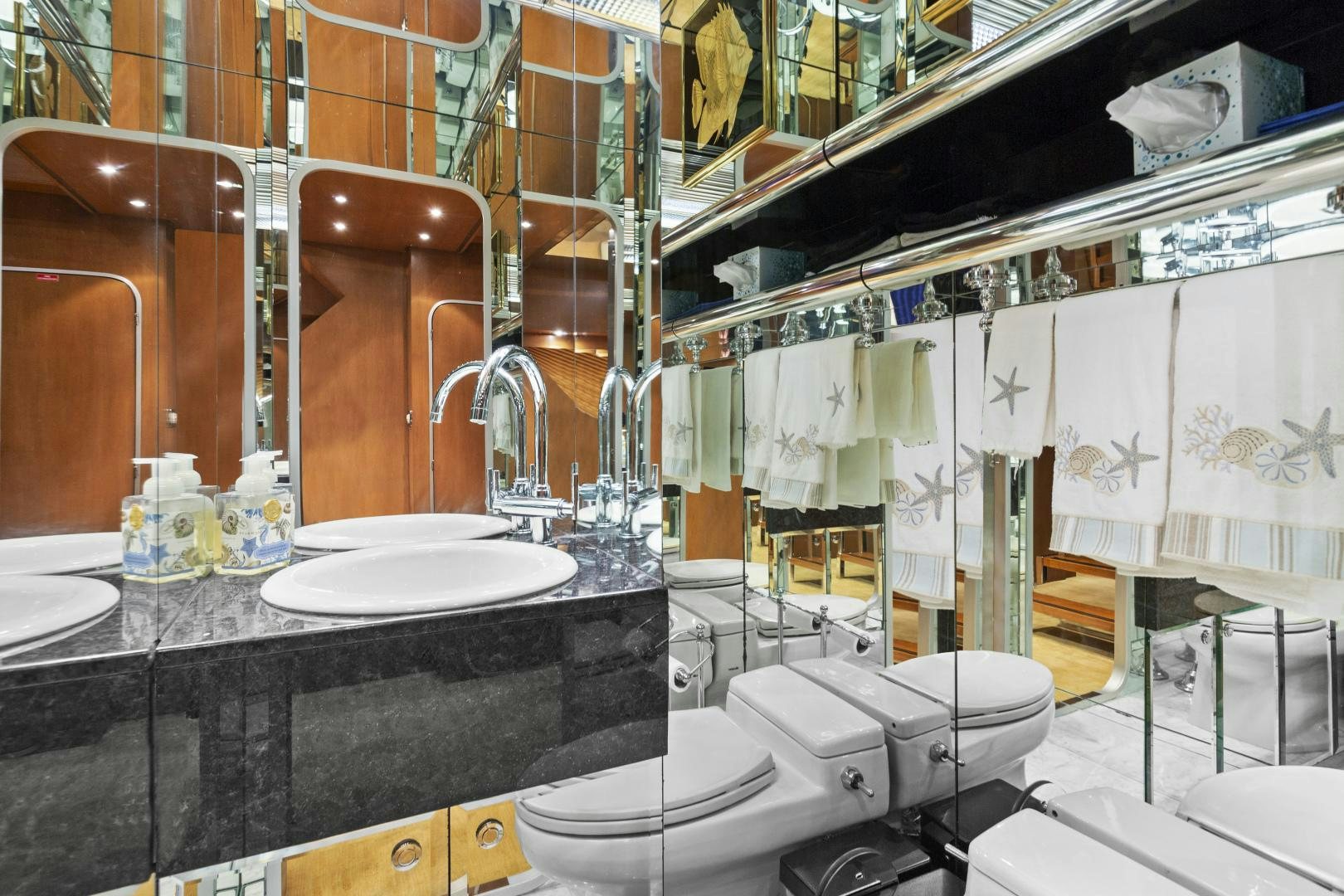 a bathroom with a large mirror aboard THE FLYING DUTCHMAN Yacht for Sale