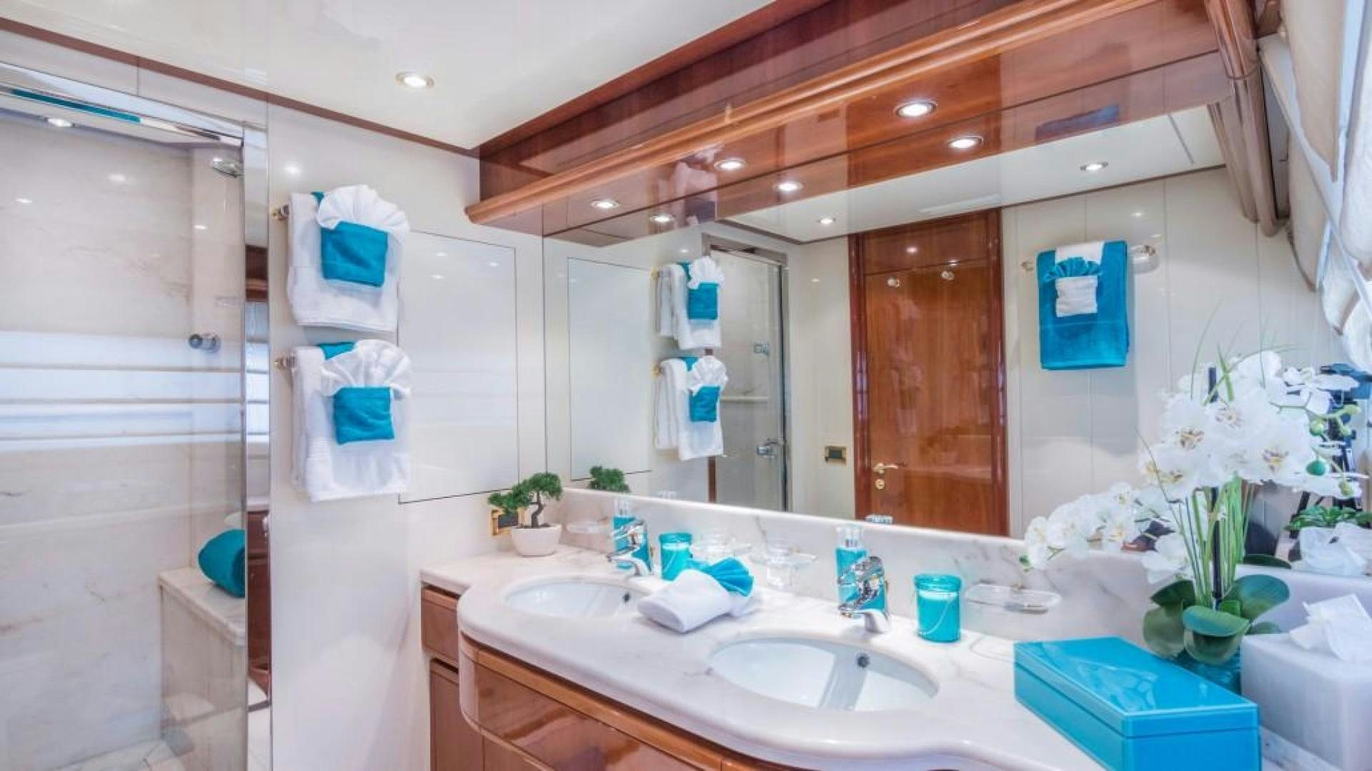 a bathroom with a large mirror aboard PARADISE Yacht for Sale