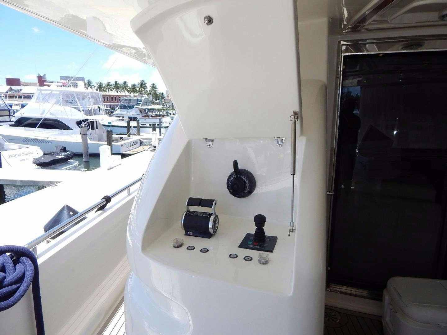 a white object with buttons and a screen on it aboard PARADISE Yacht for Sale