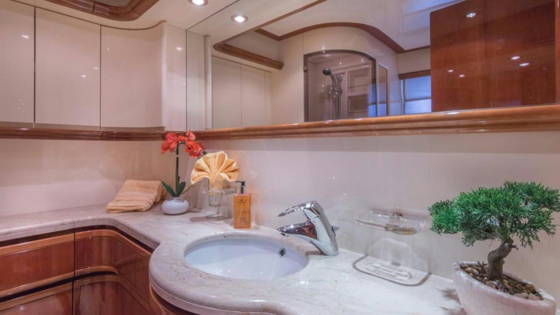 a bathroom with a sink and a mirror aboard PARADISE Yacht for Sale