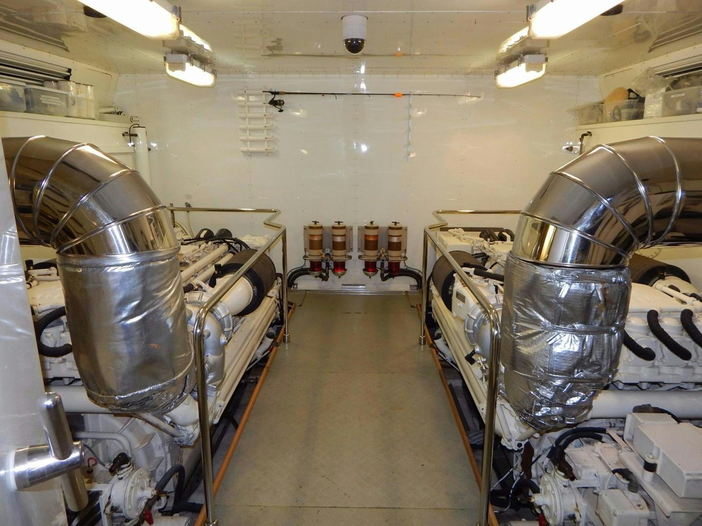 a large kitchen with many stainless steel appliances aboard PARADISE Yacht for Sale