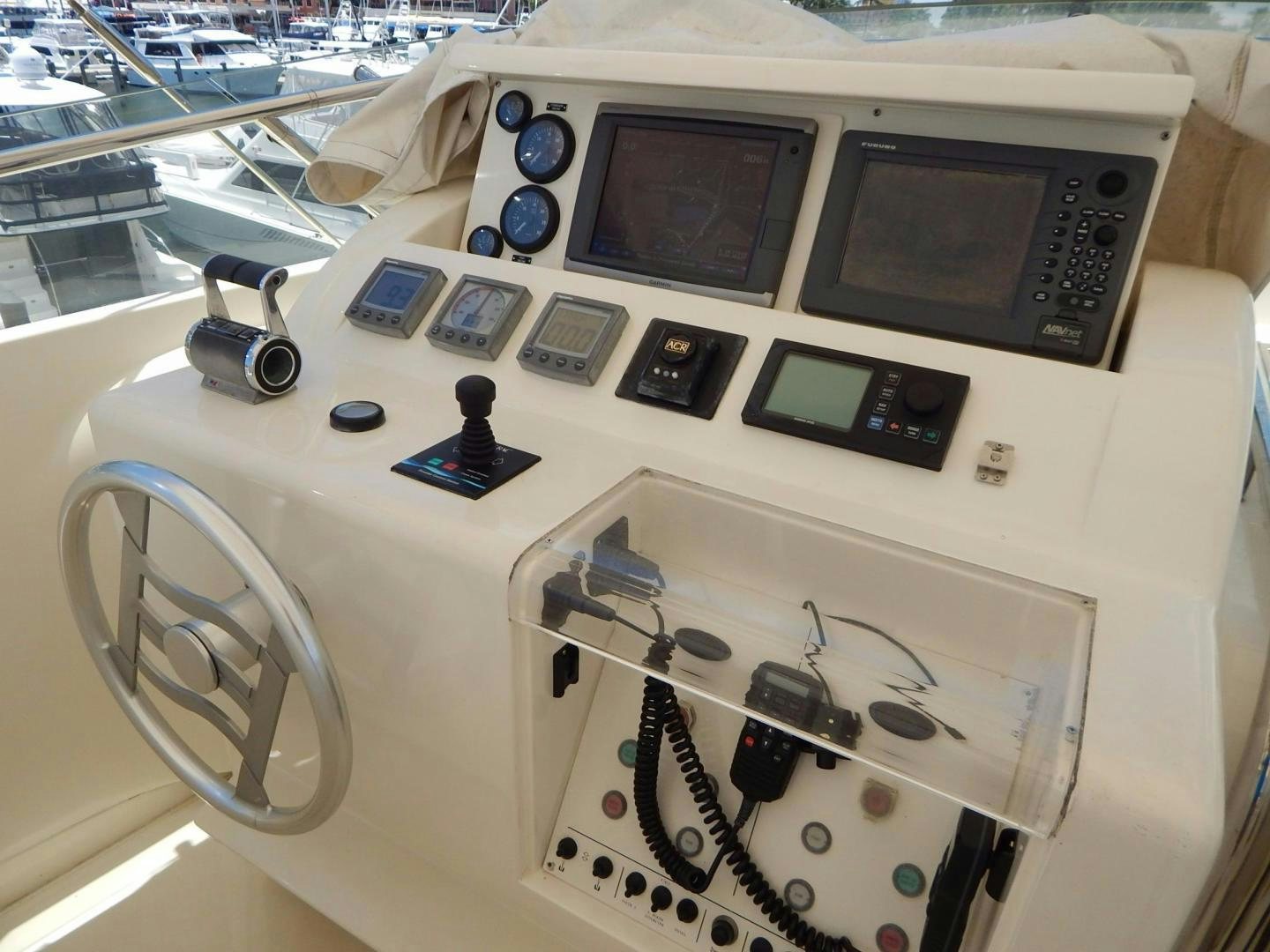 a white machine with black buttons aboard PARADISE Yacht for Sale