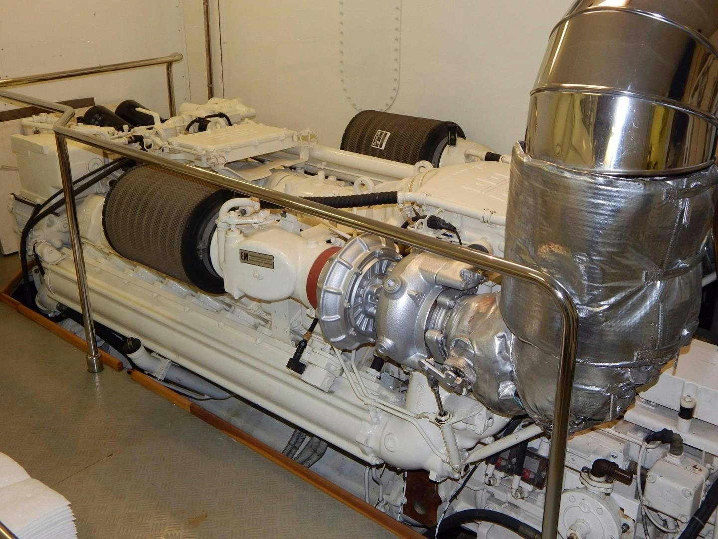 a machine with a large metal cylinder aboard PARADISE Yacht for Sale
