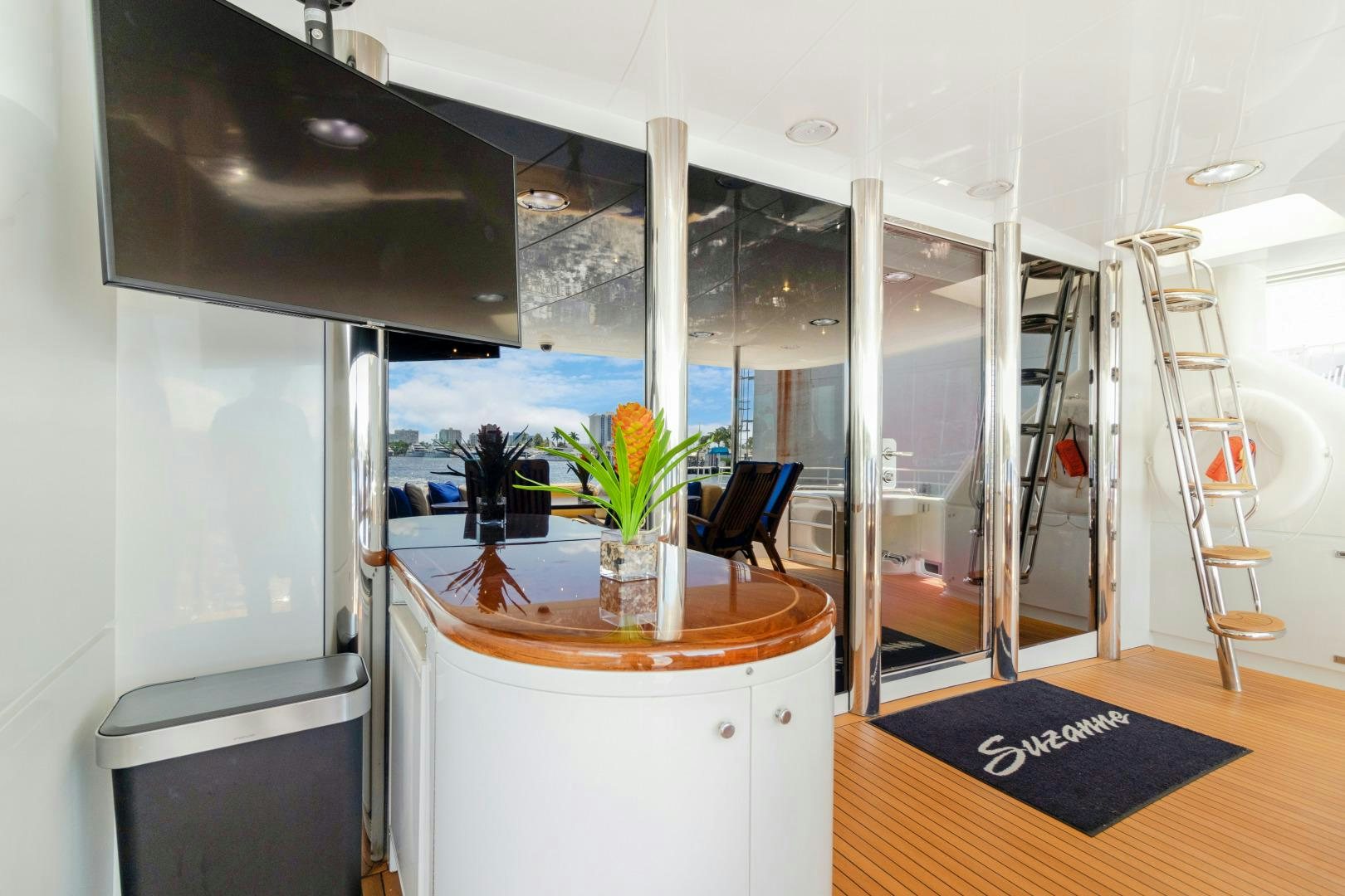 a room with a table and chairs aboard SUZANNE Yacht for Sale
