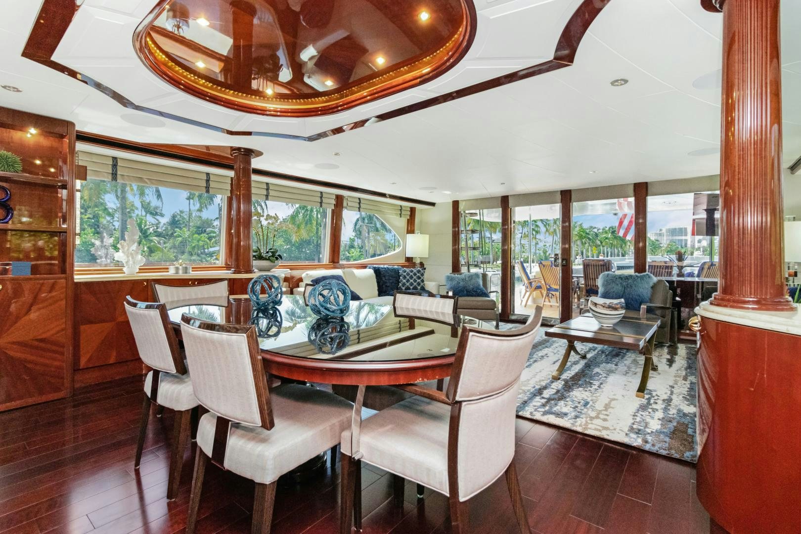 a dining room with a large open floor plan aboard SUZANNE Yacht for Sale