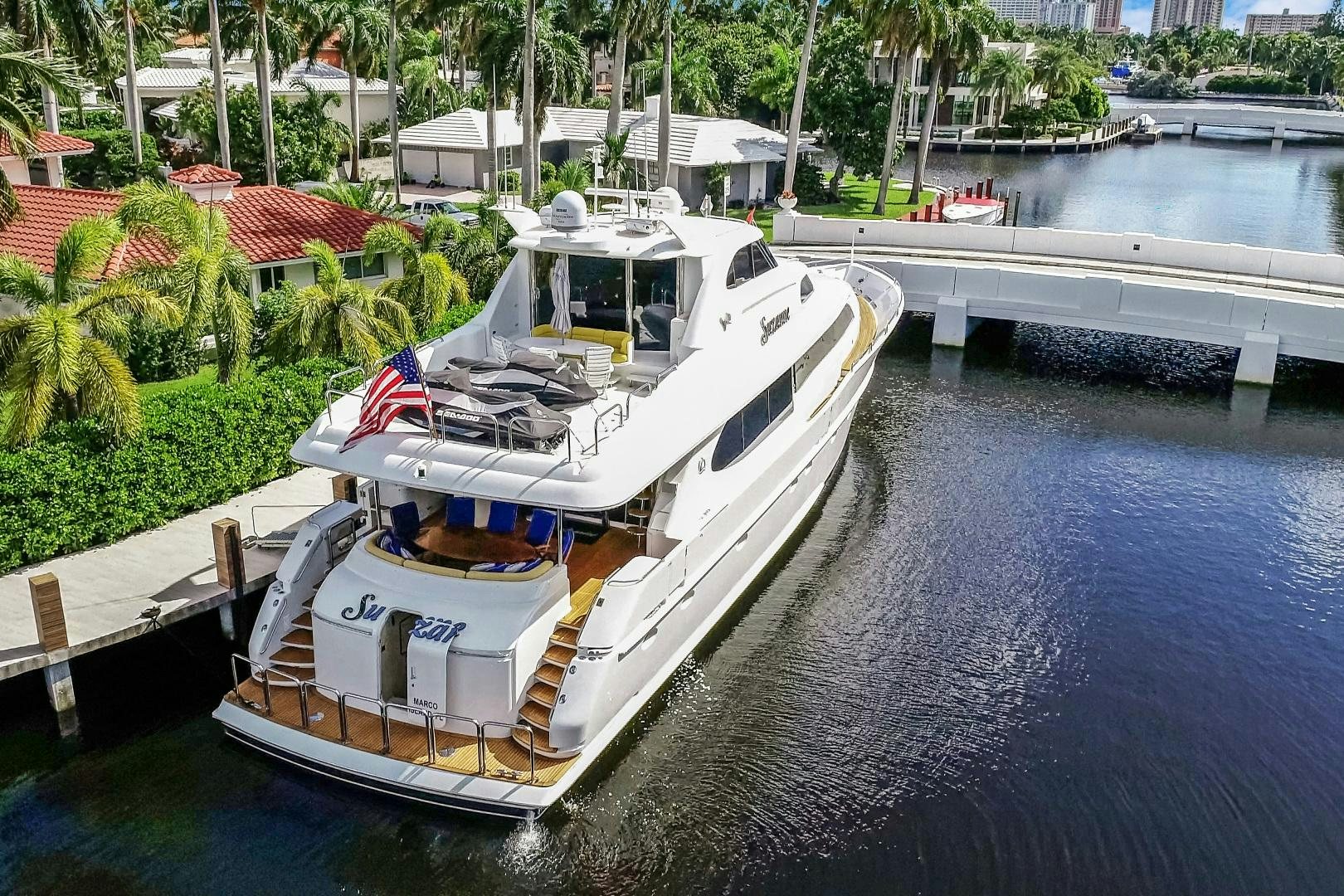 a boat docked at a pier aboard SUZANNE Yacht for Sale