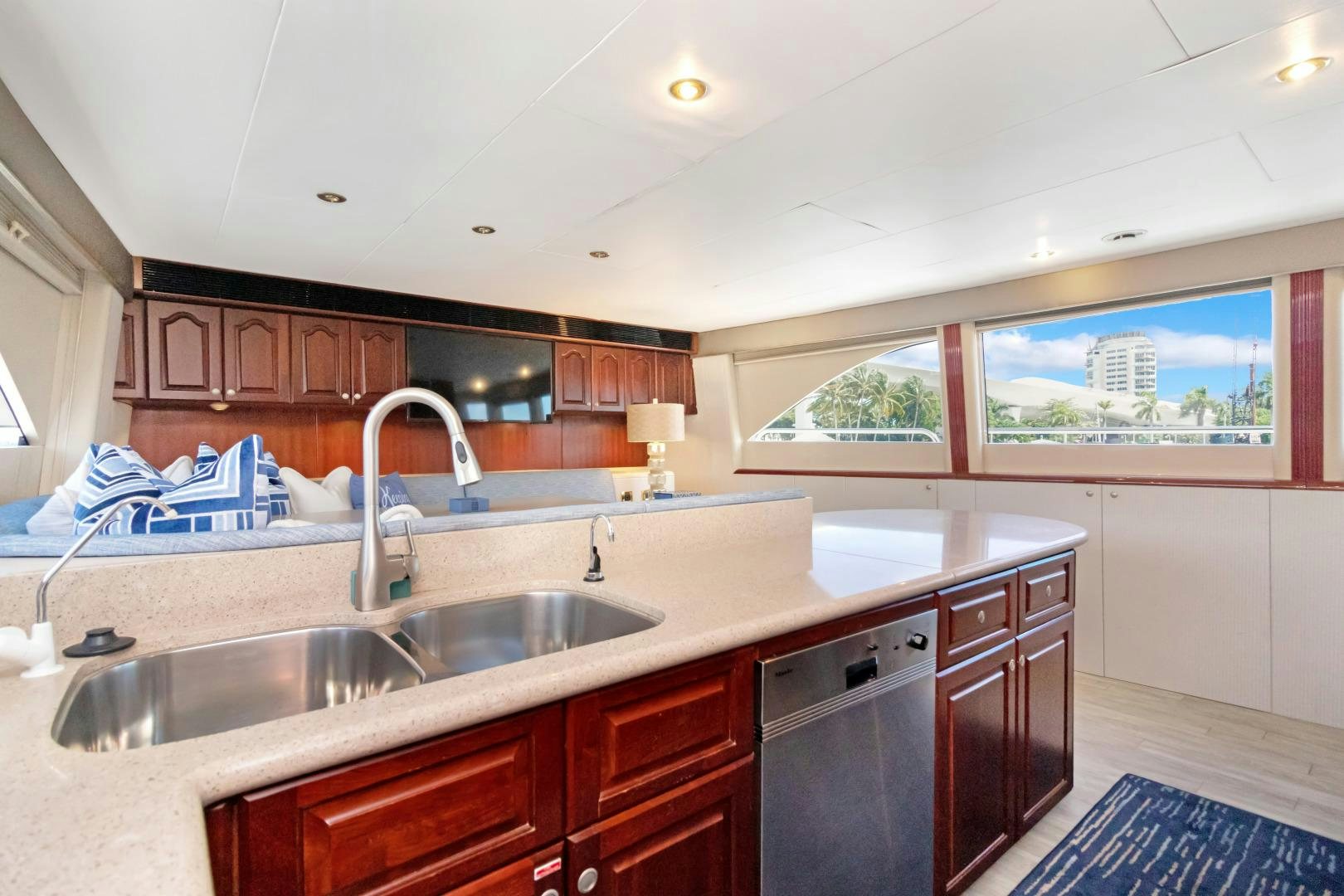 a kitchen with a sink and cabinets aboard SUZANNE Yacht for Sale