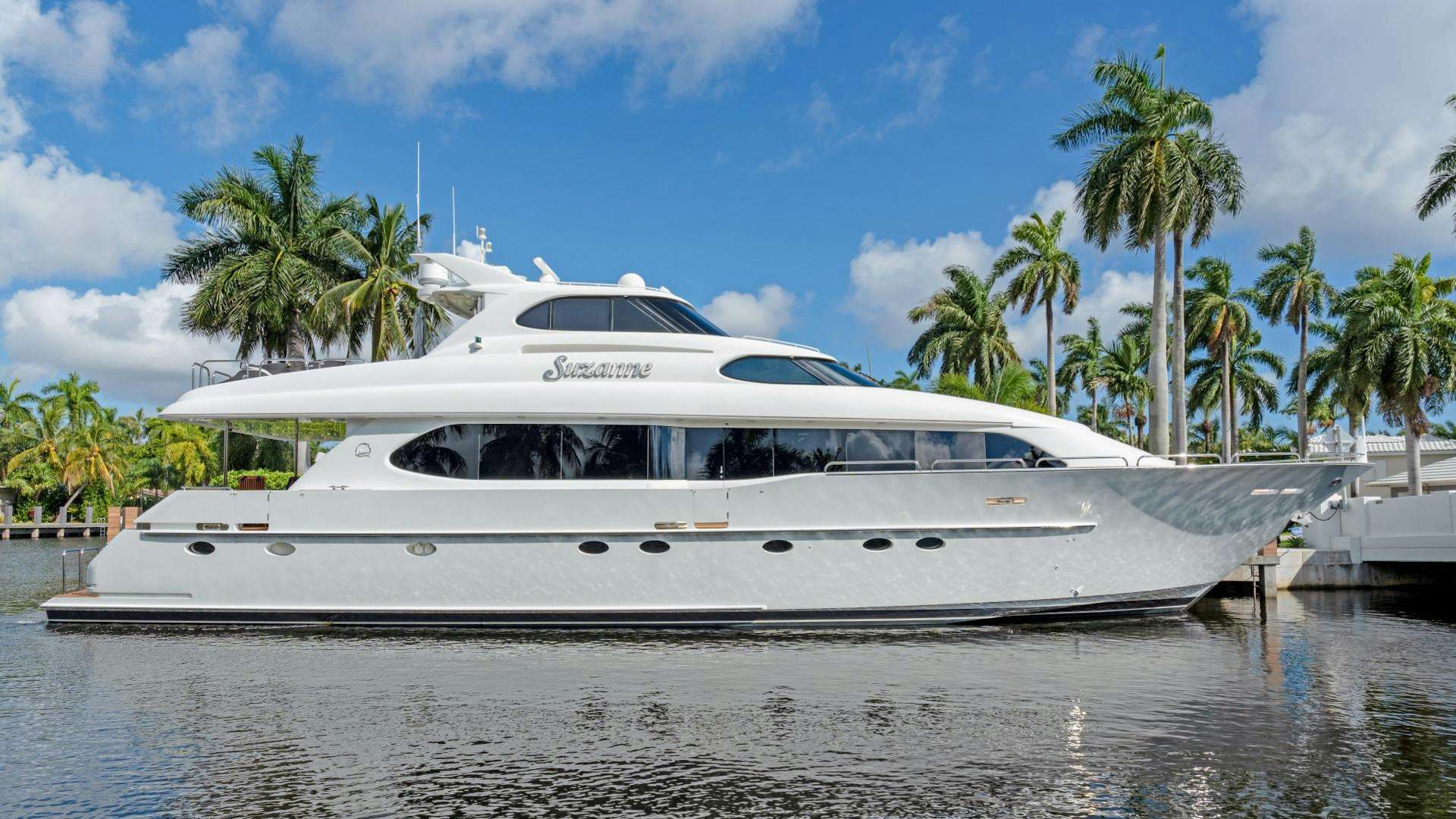 a white yacht on the water aboard SUZANNE Yacht for Sale