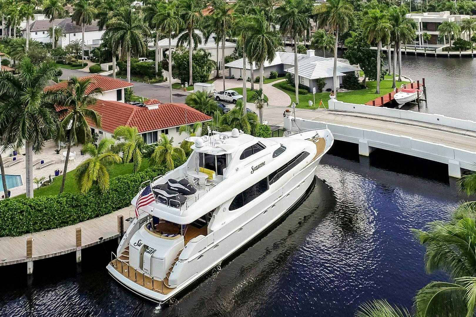 a boat docked at a pier aboard SUZANNE Yacht for Sale