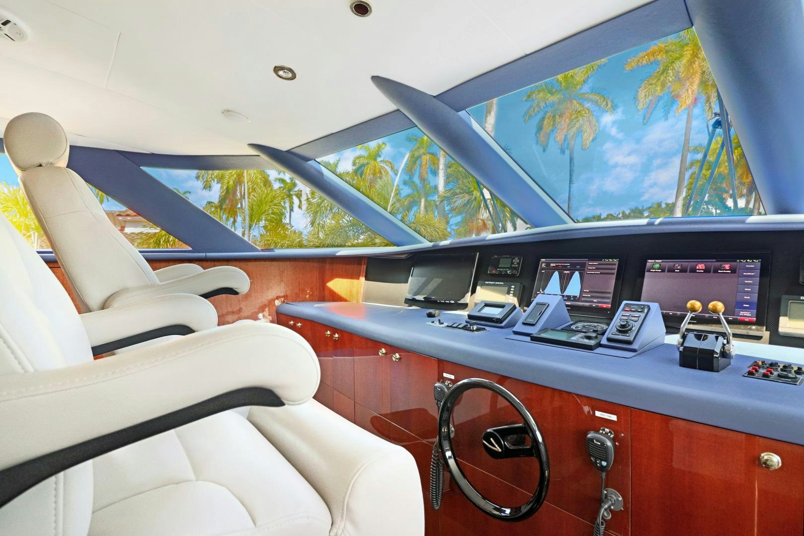 a room with a large window and a large painting aboard SUZANNE Yacht for Sale