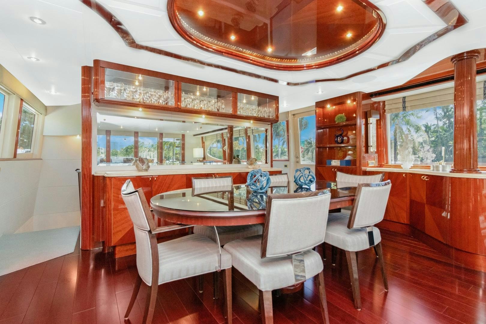 a dining room with a table and chairs aboard SUZANNE Yacht for Sale