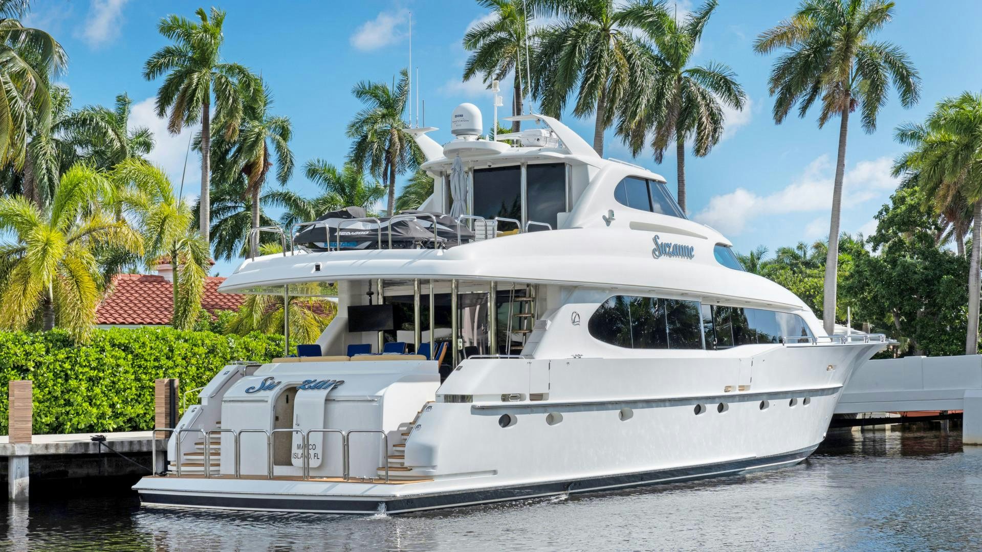 a white boat on the water aboard SUZANNE Yacht for Sale