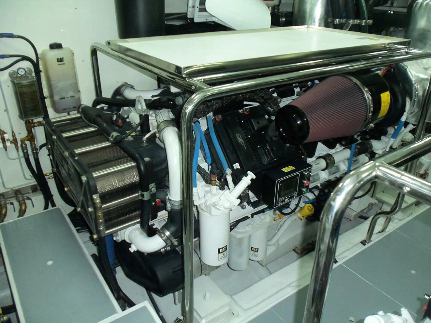 a close-up of a car engine aboard JOHNSON 93 OPEN FB Yacht for Sale