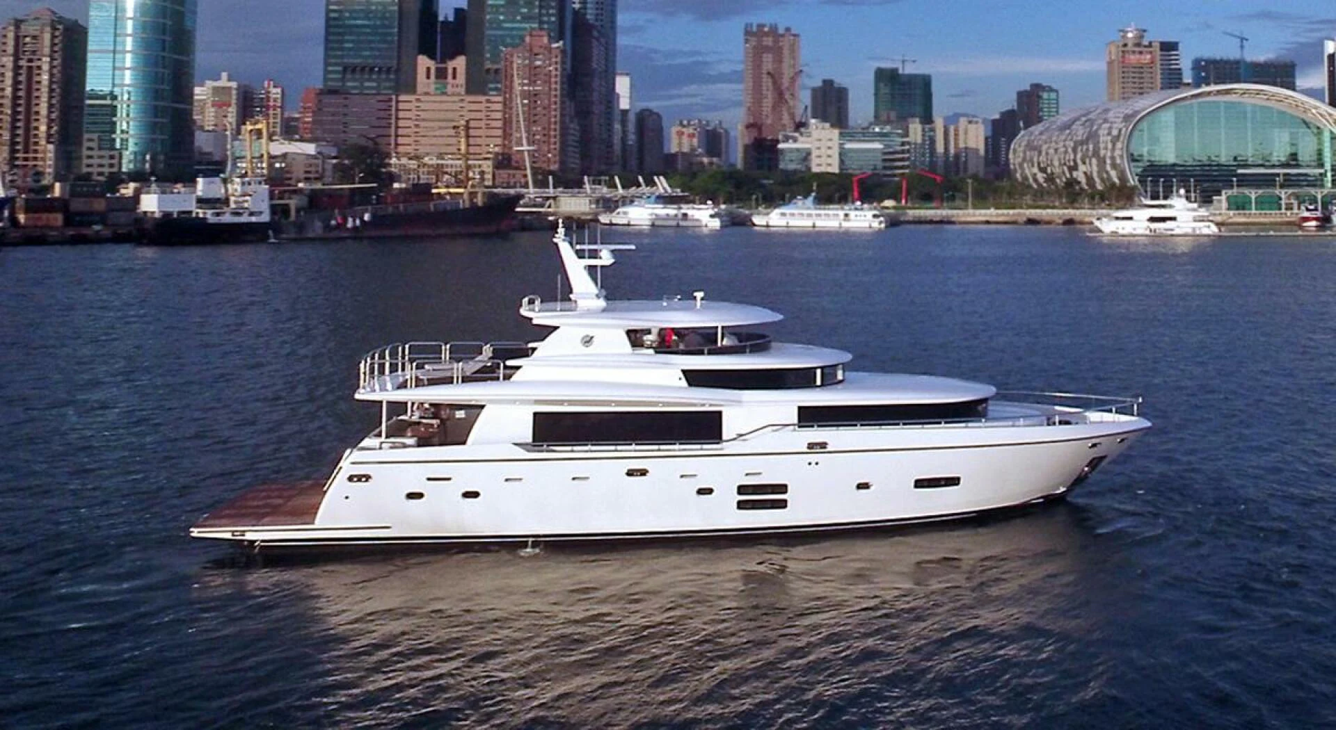 a white yacht in the water aboard JOHNSON 93 OPEN FB Yacht for Sale