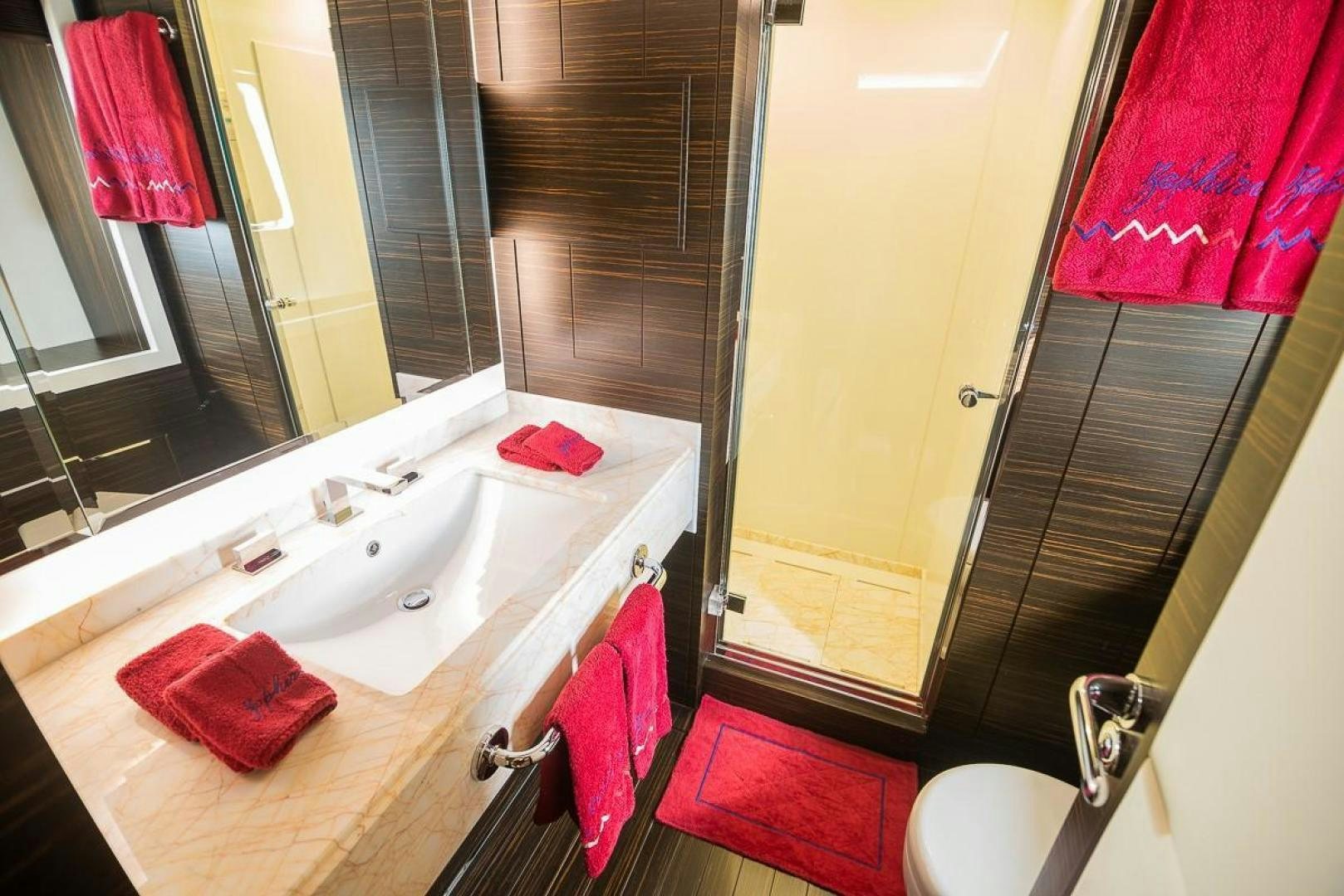 a bathroom with a sink and a mirror aboard ZAPHIRA Yacht for Sale