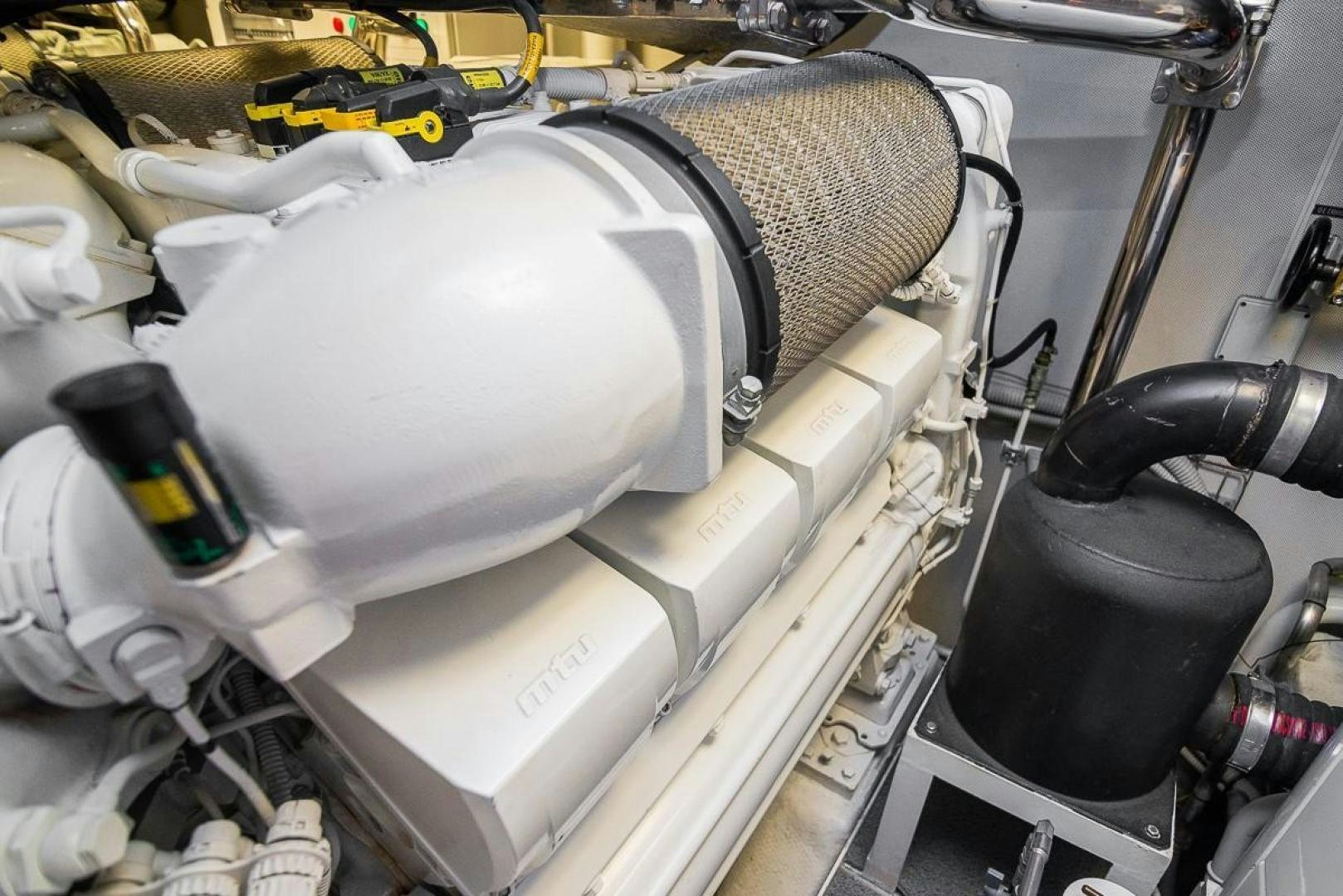 a white chair with a white hood aboard ZAPHIRA Yacht for Sale