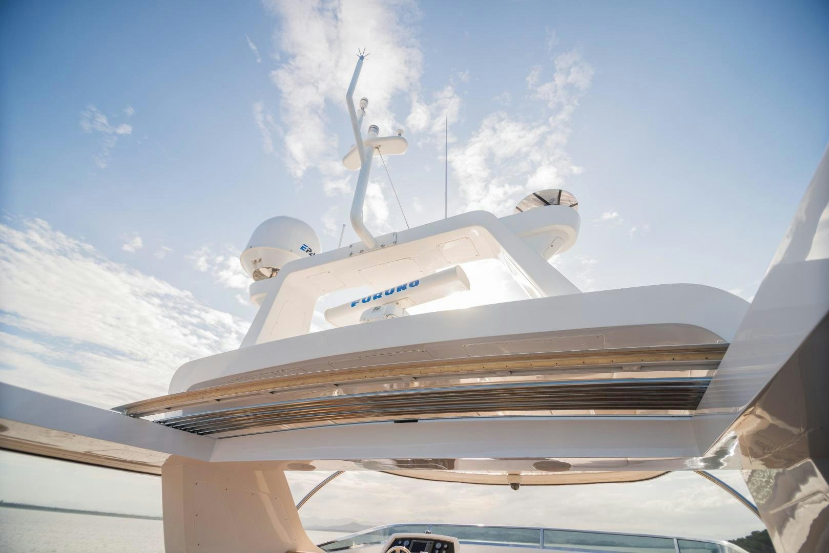 a white boat on a dock aboard ZAPHIRA Yacht for Sale