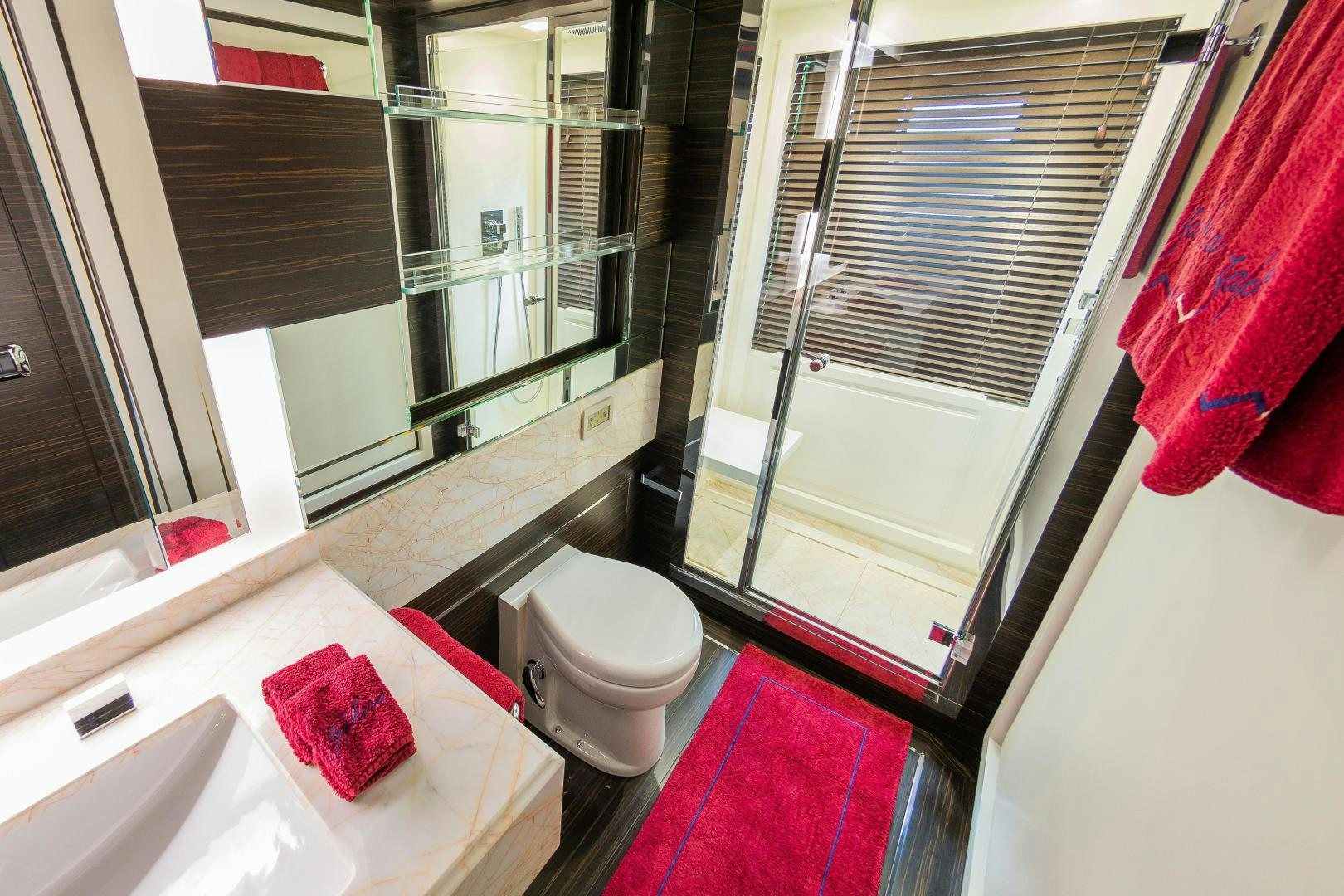 a bathroom with a toilet and a sink aboard ZAPHIRA Yacht for Sale