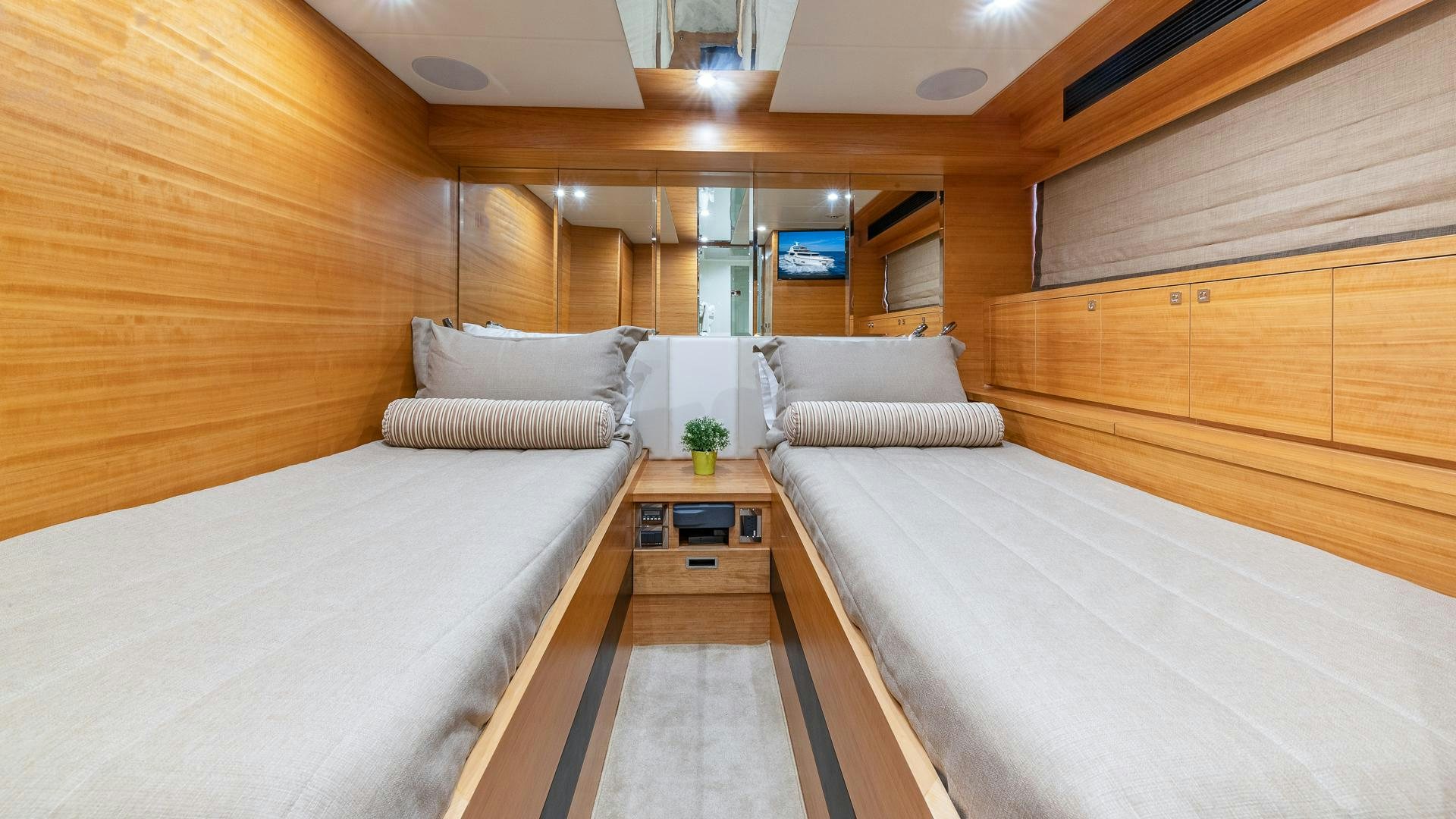 a room with a bed and a table aboard LIFE FOR SALE Yacht for Sale
