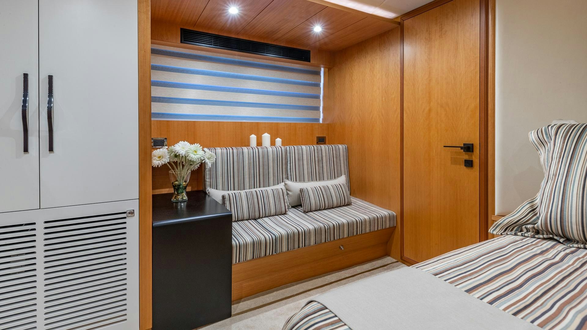 a room with a bed and a desk aboard LIFE FOR SALE Yacht for Sale